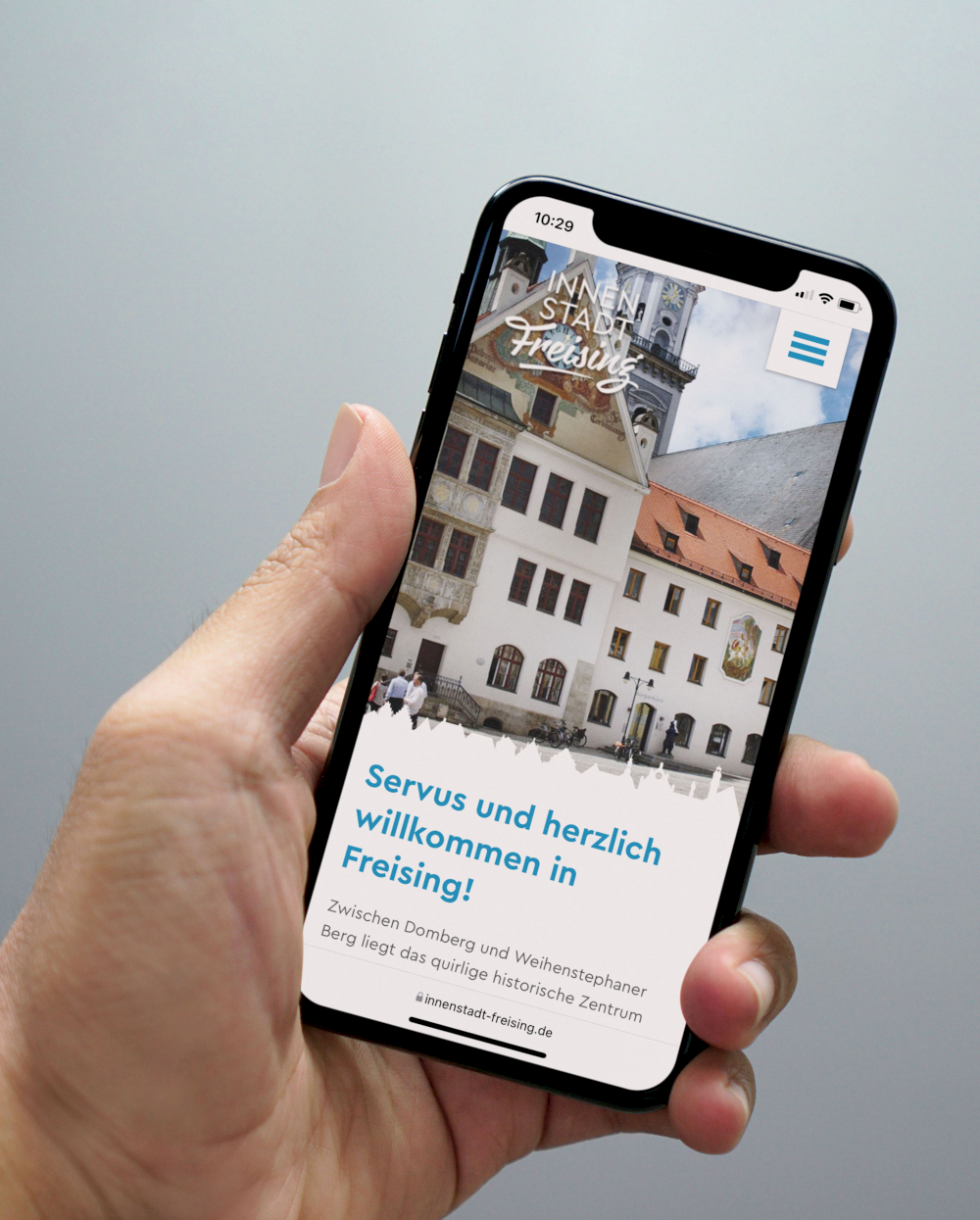 Responsive Webdesign von typneun: Aktive City Freising Website auf einem Mobilgerät
