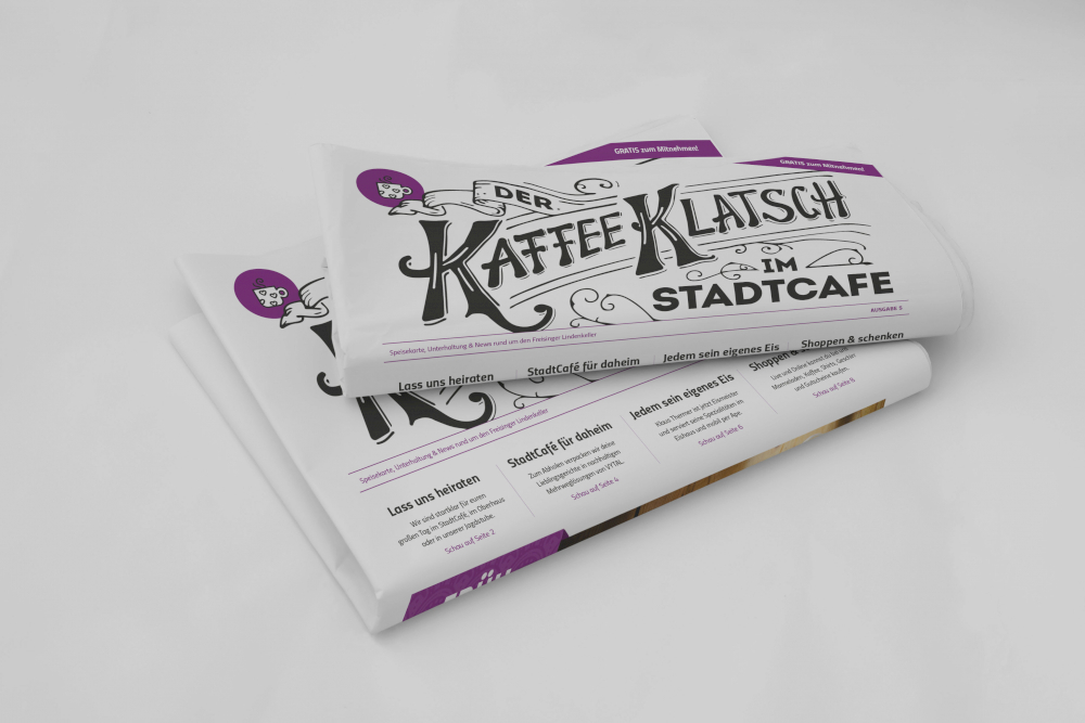 Aufregende Typografie in passendem Design auf der Kaffeeklatsch Zeitschrift vom Stadtcafé in Freising.
